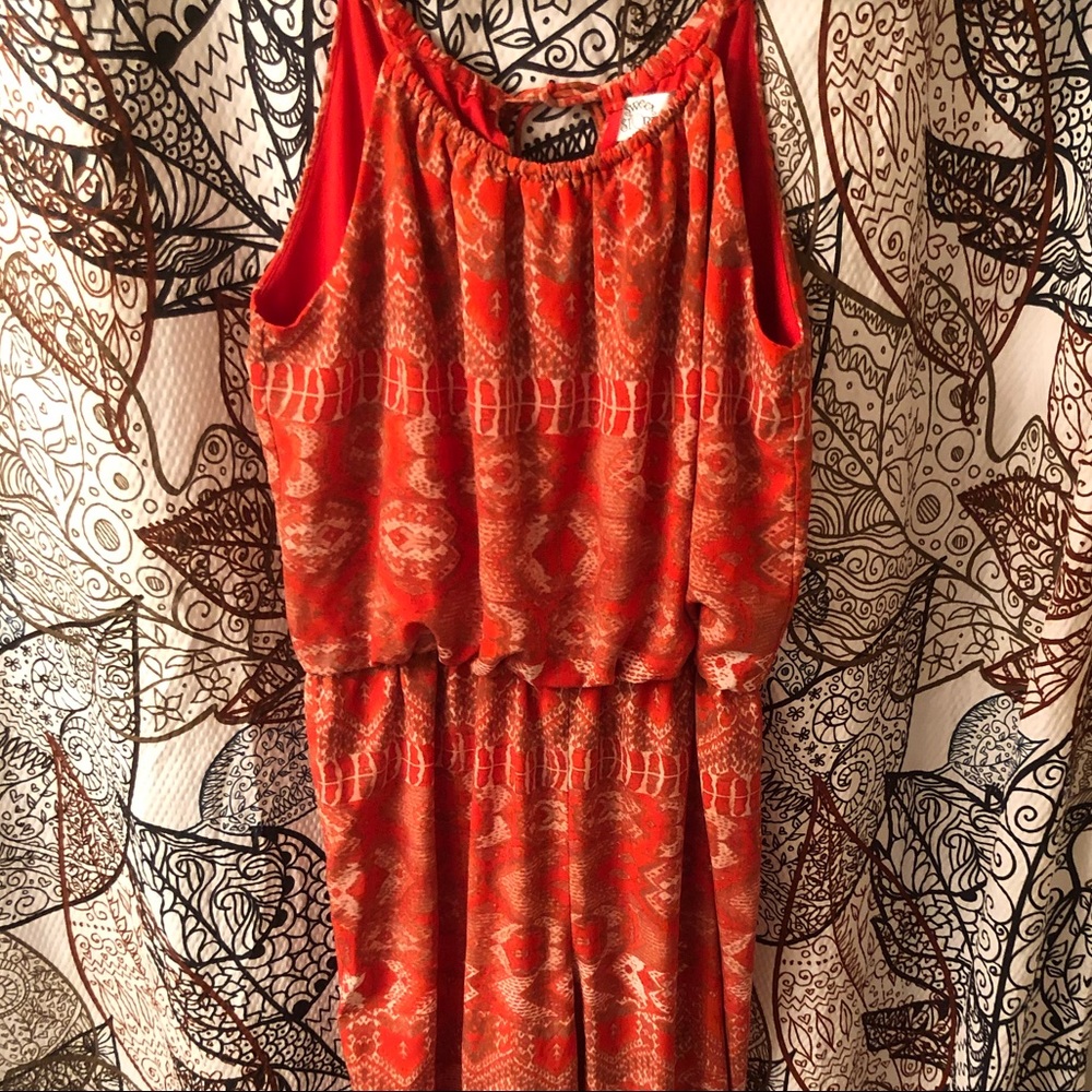 Orange and taupe sleeveless pant jumpsuit